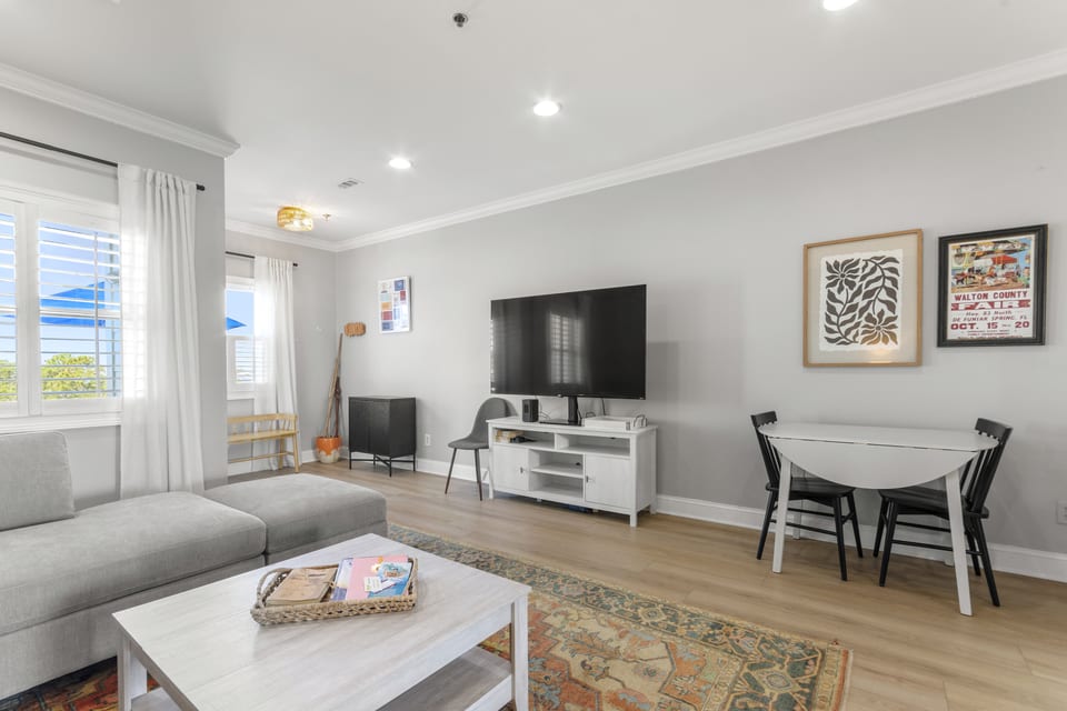 Sitting area with the television and dining seating
